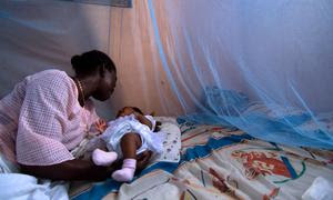 Niño en Ghana protegido por una mosquitera  Foto:  Banco Mundial/ Arne Hoel