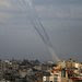 Plumes of smoke above a neighborhood in Gaza City after militants fired rockets toward Israel on Thursday after a lull in fighting.