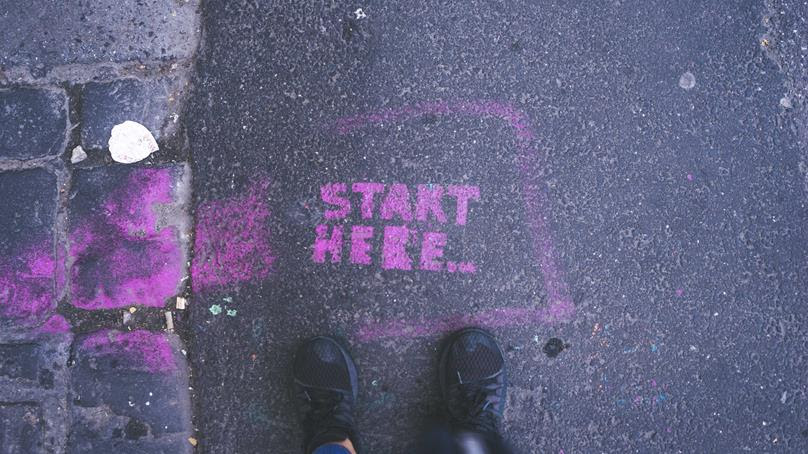 start here chalk drawing
