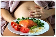 Eating fatty fish during pregnancy may boost unborn child's brain development