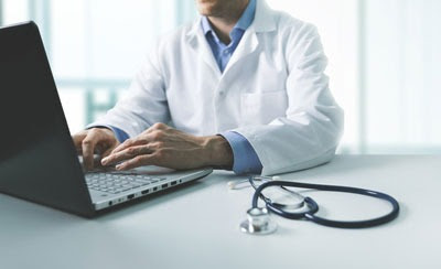 Doctor at computer