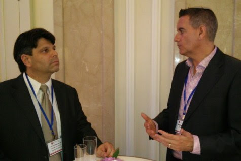 Ambassador Esteban Penrod Padilla of Costa Rica speaking with Mr. Ashley Perry, President of Reconectar, at the JPost Diplomat Conference.