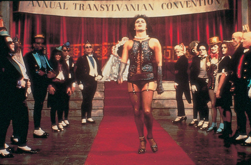 His face is heavily mascaraed, the portrait of a commedia dell'arte drag queen. The Rocky Horror Picture Show Im Kinopolis Main Taunus