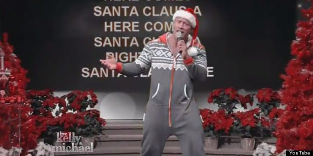 Watch The Rock Sing Christmas Karaoke In A Onesie