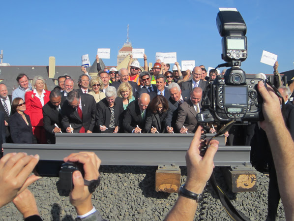 Governor Brown and other leaders sign the date into history!