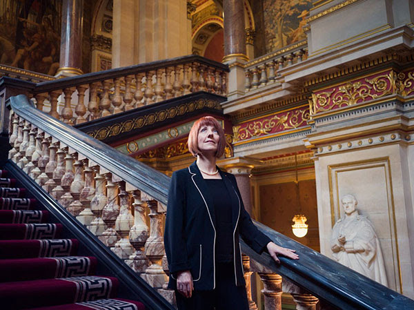 Carole Mundell descends the ‘Grand Staircase’ in the Foreign Office