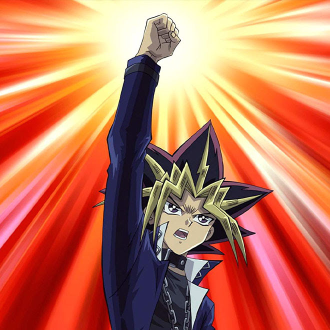 Yami Yugi raises his fist in fierce determination with a radiant burst effect behind it.