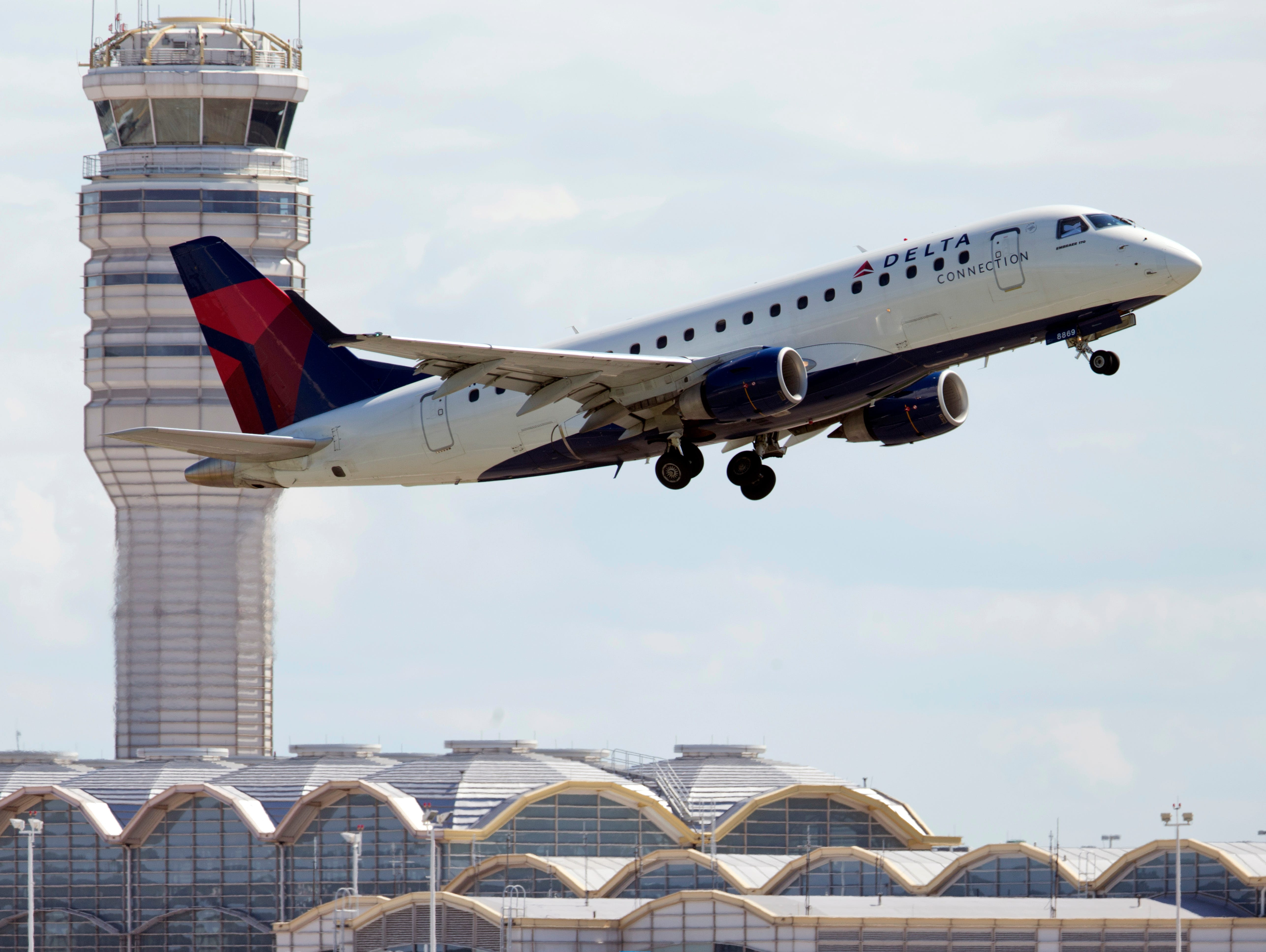 A Delta Air Lines jet takes off from Washington Reagan National Airport on July 28, 2014.