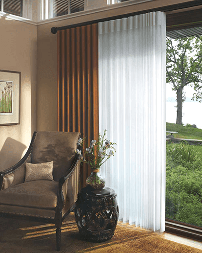 They glide easily along the custom tracks. Ripple Fold Draperies Island Window Covering