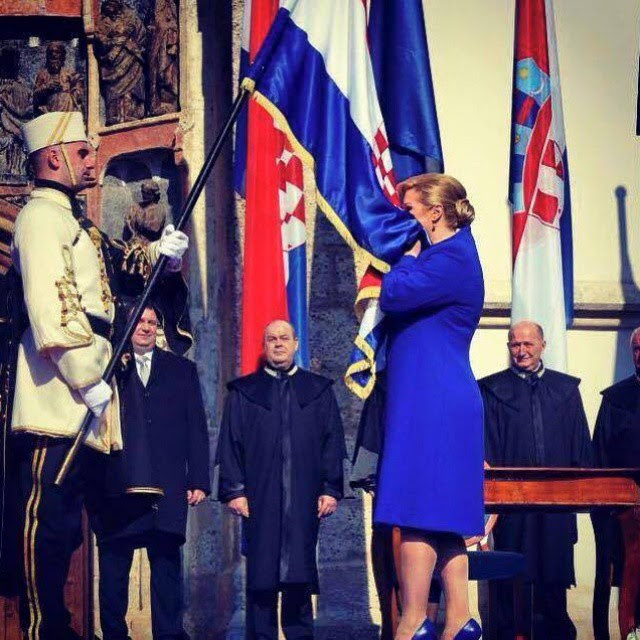 Kolinda Grabar Kitarovic kissing flag