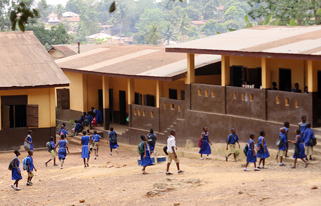 Pupils of the UMC Kulanda Town in Bo, in southern Sierra Leone, rush back to class in March 2020, shortly before schools were closed down after the first cases of COVID-19 were confirmed in the country. There are more than 350 United Methodist schools in Sierra Leone, with the majority of them assisted by the government and affected by the free education initiative. File photo by Phileas Jusu, UM News.