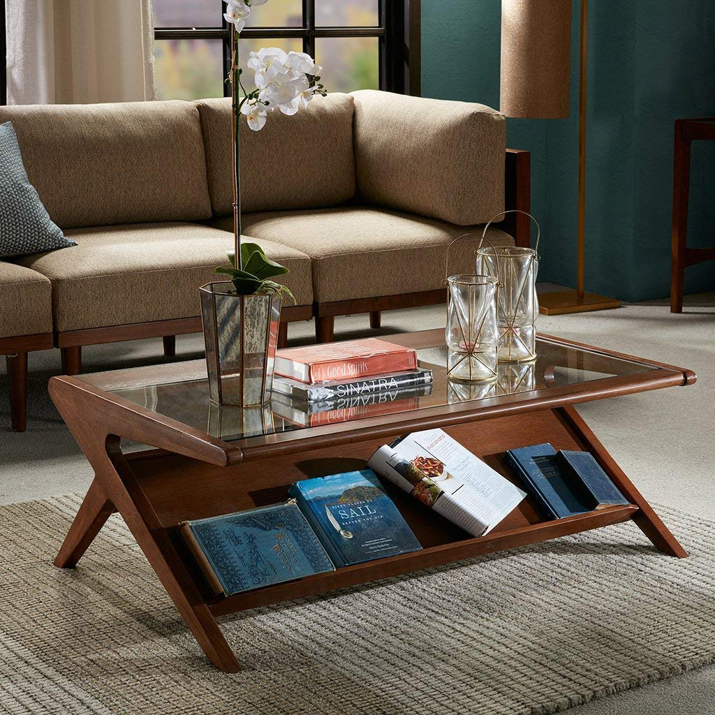 Made of metal and top with a tempered glass tabletop, it also has an open mirror shelf to store and display various. 51 Glass Coffee Tables That Every Living Room Craves