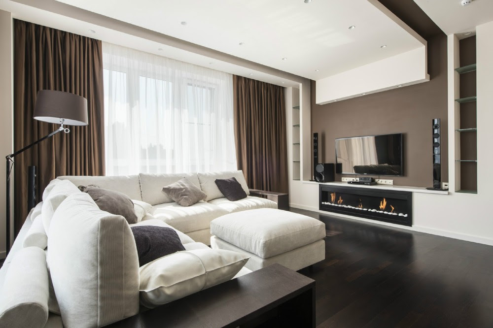 Check out the first of 8 makeovers from a traditional north american living room to a casual beachy airy space of designer quality. Taupe Interior Design