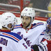 Henrik Lundqvist, second from right, with his teammates after he made 42 saves to preserve the Rangers' victory. They led by 4-1 early in the third period before the Capitals scored twice.