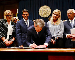 Georgia Governor Brian Kemp signs bill to ban abortions after 6 weeks of pregnancy