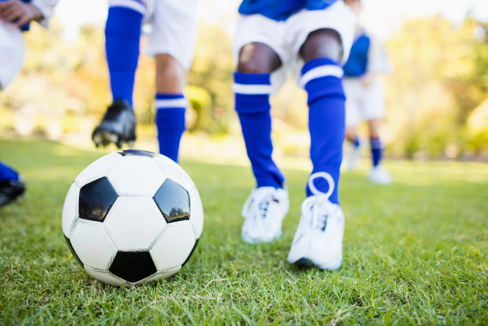 children playing soccer