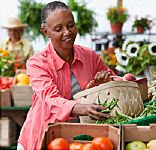 man feeding woman