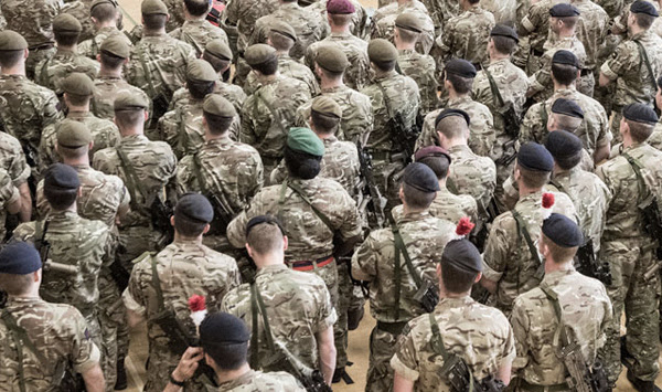 Soldiers with their backs to the camera