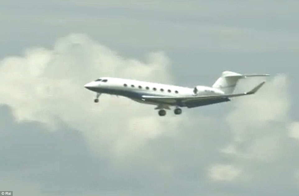 On their way: Barack and Michelle arrived in Italy on a private plane (pictured) on Friday for a six day vacation in Tuscany