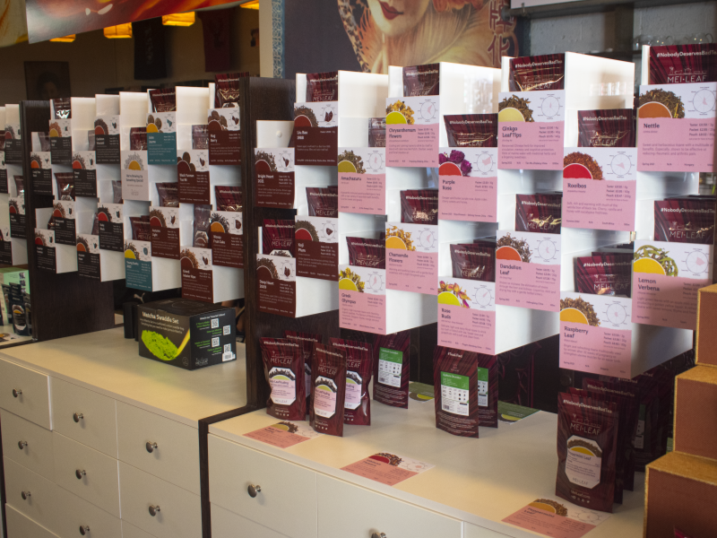 A shop display of teas