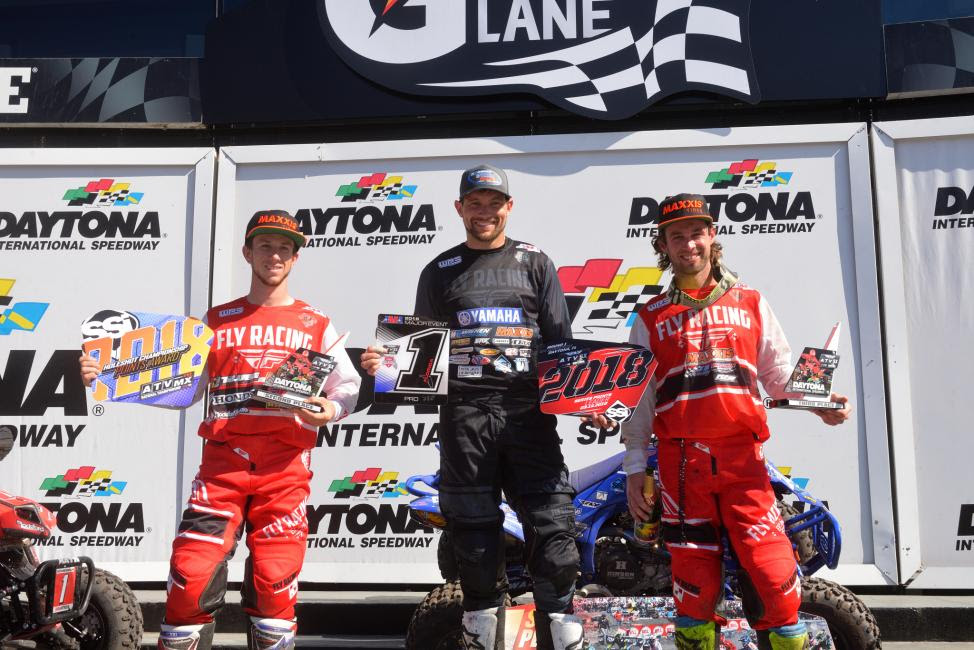 Chad Wienen (center), Joel Hetrick (left) and Jeffrey Rastrelli (right) earned the top three positions at the 4th Annual ATV Supercross. 