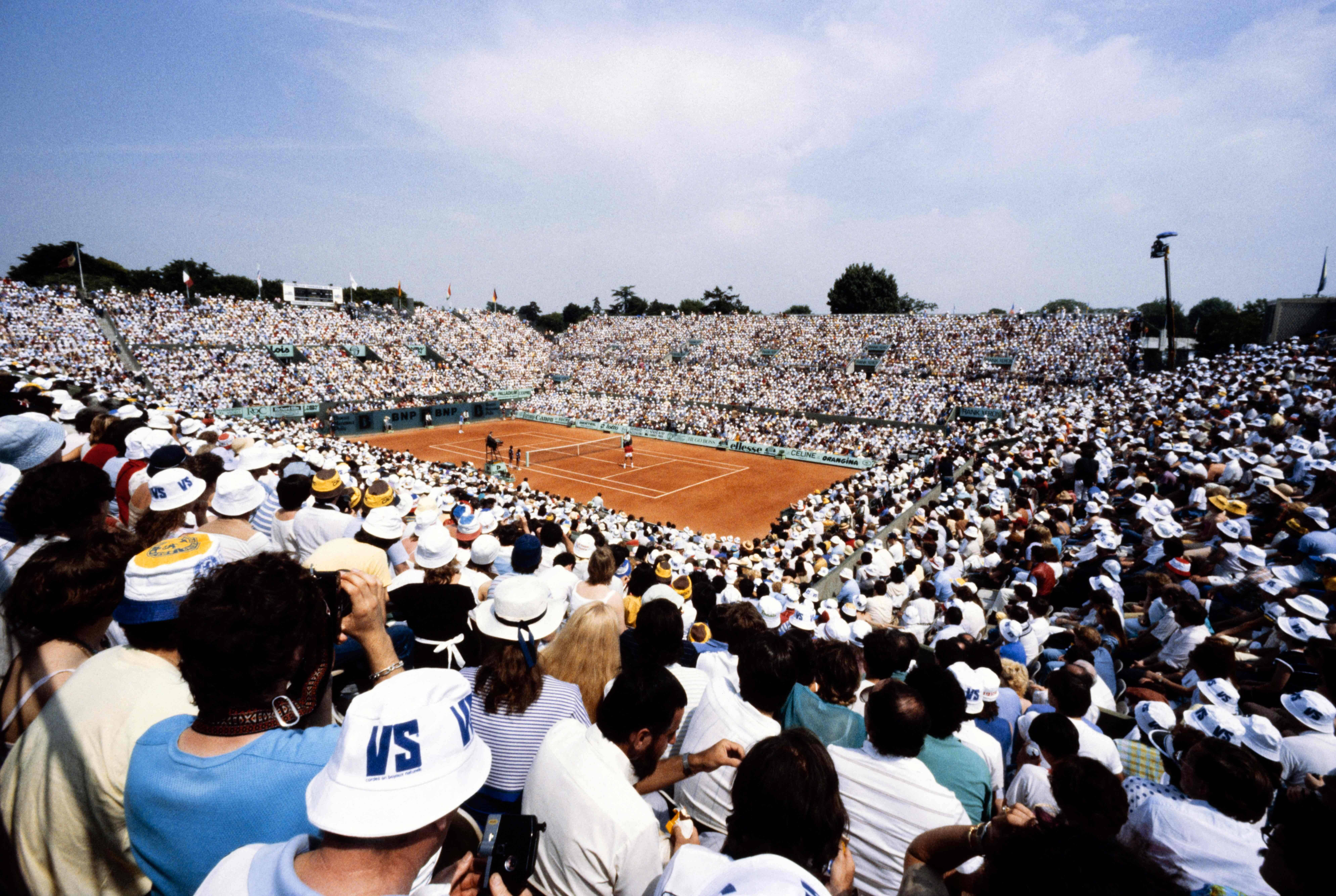 (FILES)This general view shows spectators as they watch play in the men's singles final match between France's Yannick Noah and Sweden's Mats Wilander of The Roland Garros 1983 French Open tennis tournament in Paris on June 5, 1983. It's been 40 years since a French player last won the men's singles title at Roland Garros and Yannick Noah's 1983 achievement is unlikely to be matched this year when the second major of the season starts on May 28, 2023. (Photo by AFP)