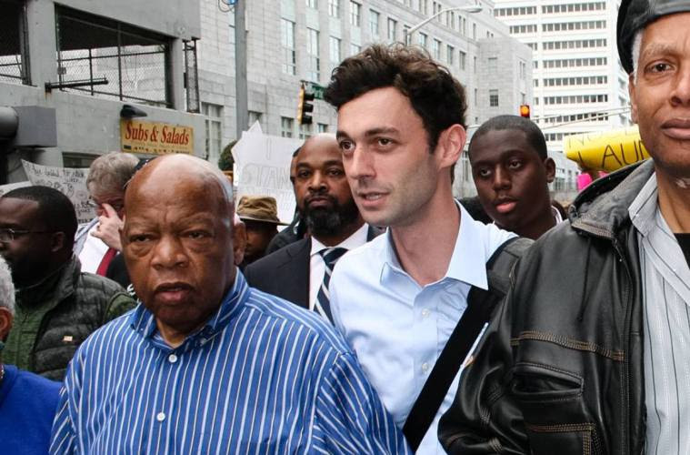 Turn on images to see Jon Ossoff and John Lewis marching together.