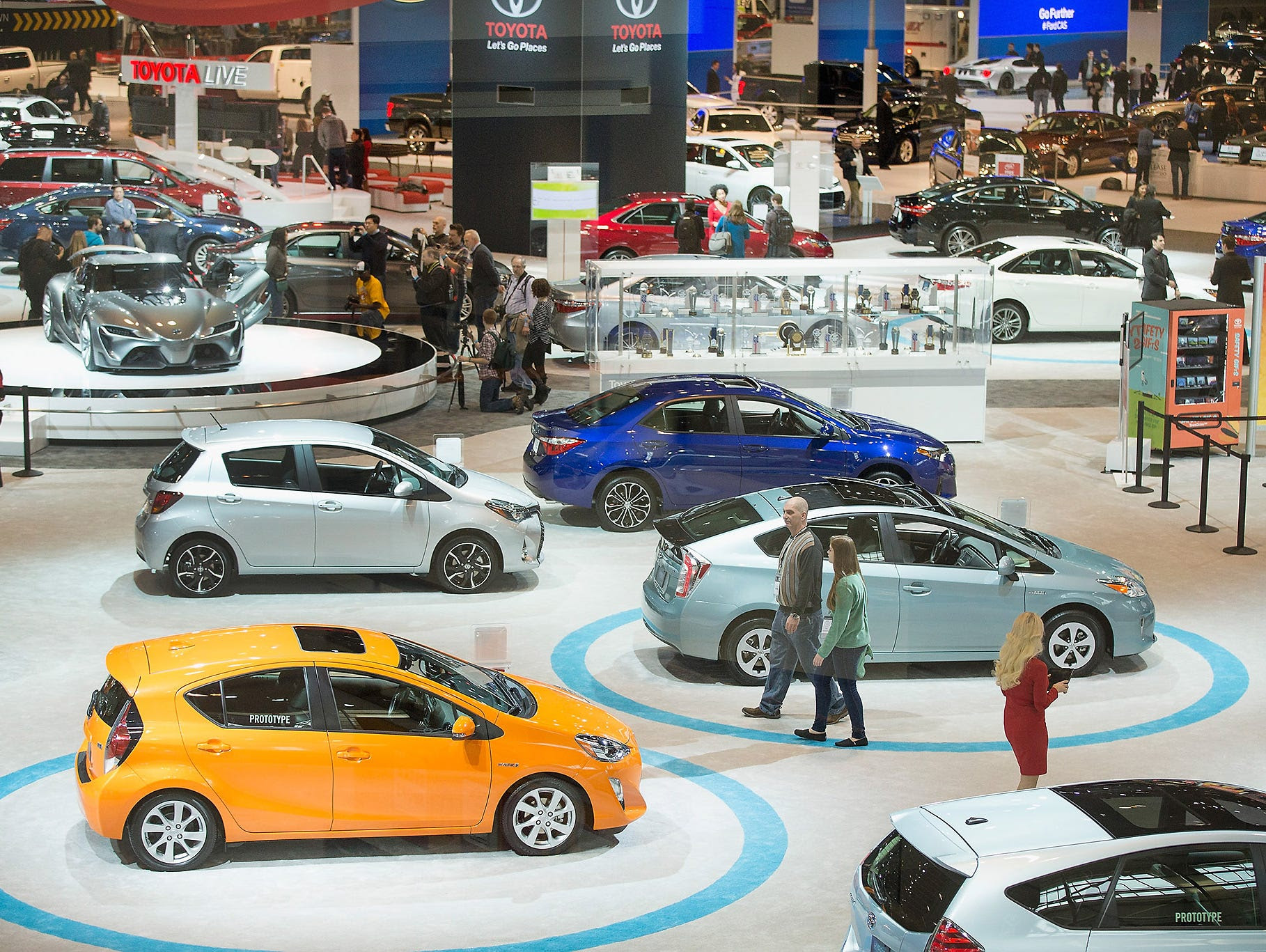 CHICAGO, IL - FEBRUARY 13:  Guests look over cars at the Chicago Auto Show during the media preview on February 13, 2015 in Chicago, Illinois. The auto show, which has the highest attendance in the nation, will open to the public February 14-22.  (Ph