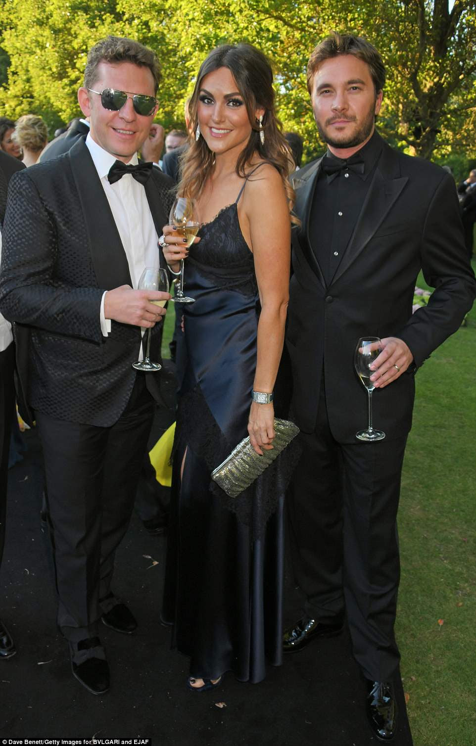 Dressed to impress: (L to R) Nick Candy, Elle Caring and Ben Caring posed for a photo