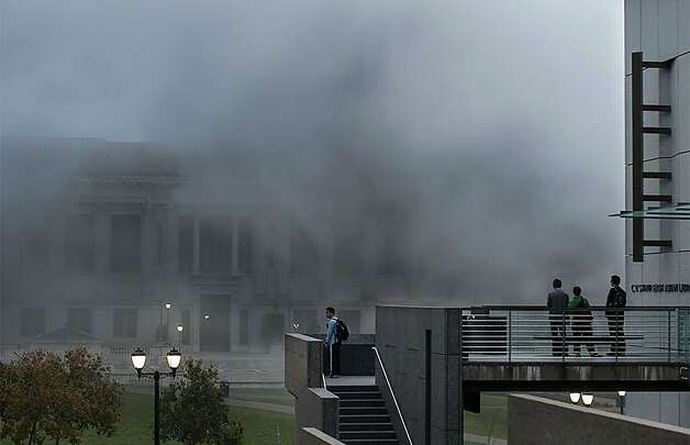 Students watch smoke from the East Asian Library after an explosion on UC Berkeley's campus on September 30, 2013 in Berkeley, Calif. Photo: Michael Drummond, The Daily Californian