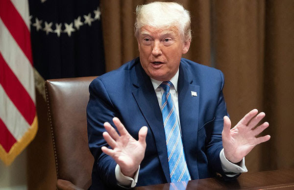 US President Donald Trump speaks during a roundtable meeting