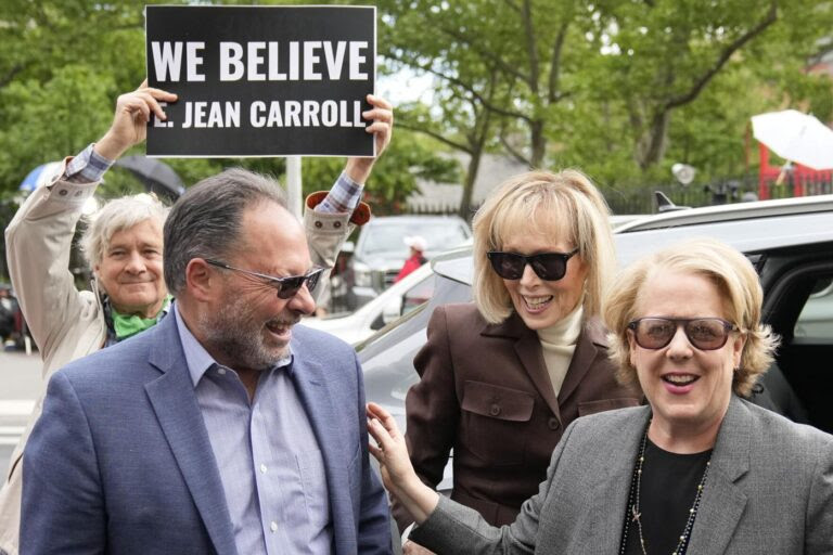 E. Jean Carroll and her attorneys laughing about something as if the rape case was funny.