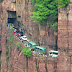 [New post] It’s peak time! Terrifying cliff-side traffic jam as hordes of tourists swarm to see China’s ‘most dangerous village’ perched on top of mountain 