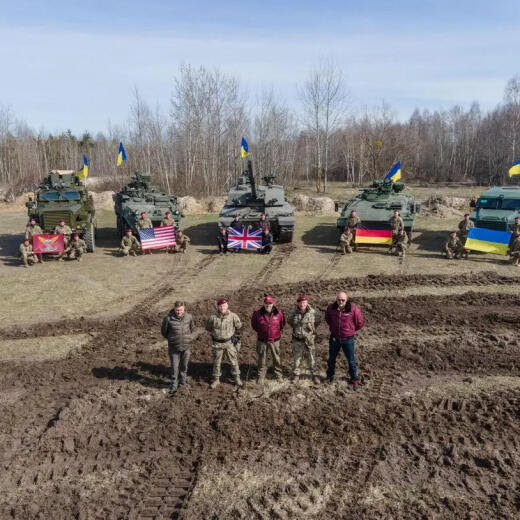 Ukraine's Defence Minister Oleksii Reznikov and Commander of the Air Assault Forces Maksym Myrhorodskyi pose for a picture in front of British Challenged 2 main battle tank, U.S. Stryker and Cougar armoured personnel carriers and German Marder infantry fighting vehicle, amid Russia's attack on Ukraine, in an unknown location in Ukraine, in this handout picture released March 27, 2023. Press Service of the Defence Ministry of Ukraine/Handout via REUTERS ATTENTION EDITORS - THIS IMAGE HAS BEEN SUPPLIED BY A THIRD PARTY.