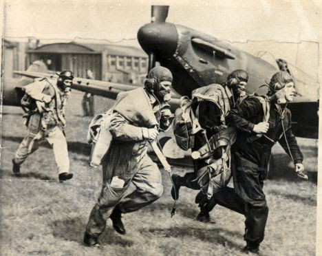 Ready for action: RAF fighter pilots respond to the scramble