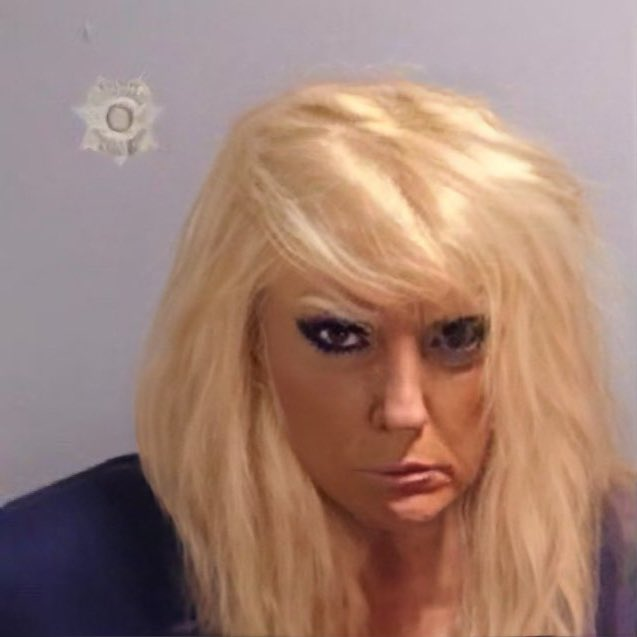 Trump mugshot meme. Trumpmade up to look like a whore.