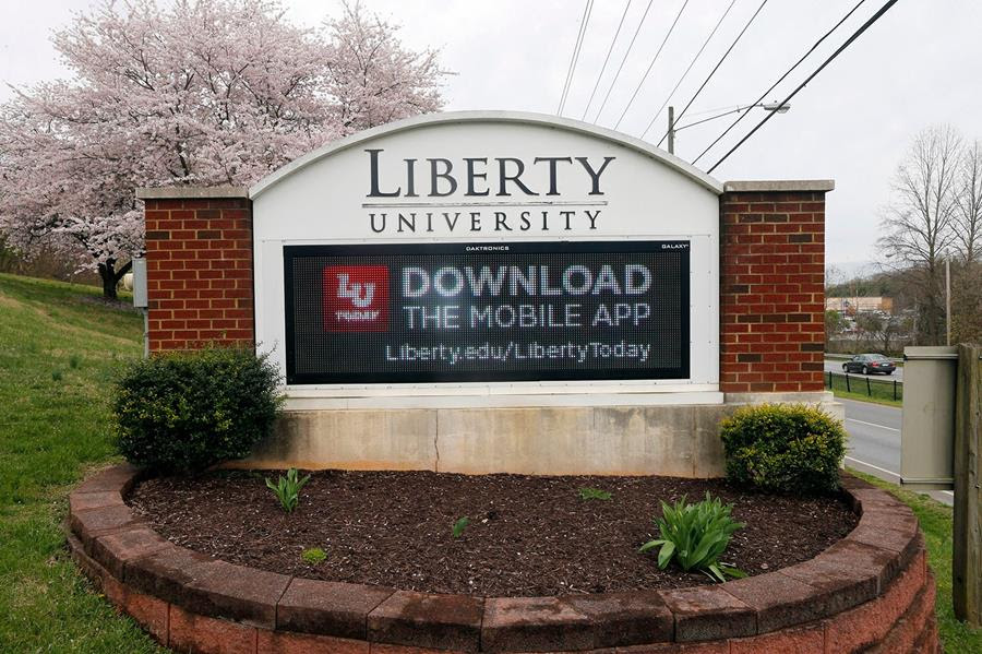 A sign marks an entrance to Liberty University in Lynchburg, Virginia, March 24, 2020.