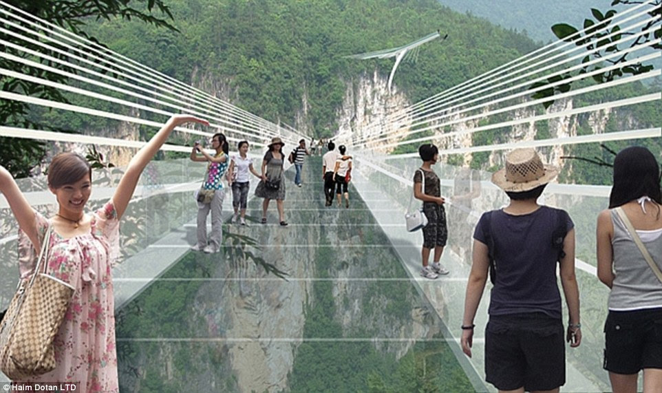 If you have vertigo look away!                                    The  world's highest and longest                                    glass-bottomed  bridge is set to open                                    in China in July