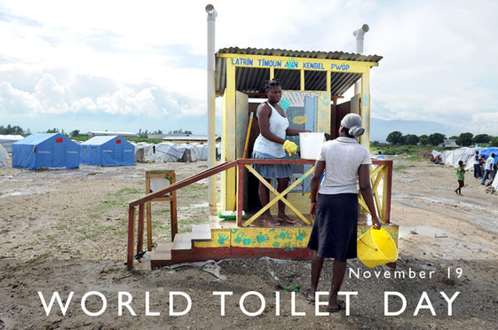 Women at a latrine