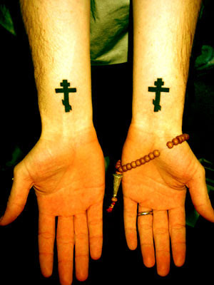 Two cross tattoos on side rib of a man. Fengdeczaded Cross Tattoo On Wrist