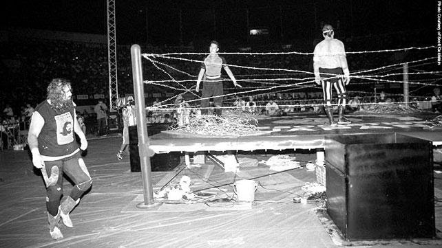 Cactus jack vs terry funk in a no rope, barbed wire, explosive barbed wire board, time bomb. Cactus Jack And Terry Funk Blow Each Other Up With C4 In Japan