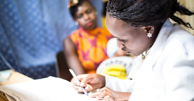 The figure shows a doctor speaking with a female patient in an African clinic.