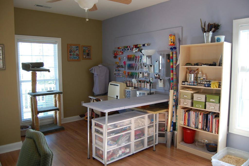 Craft rooms deserve a bold hand with color and glamour, so extend the accent shade you've chosen throughout the space onto your organization tools. Craft Room Home Studio Ideas