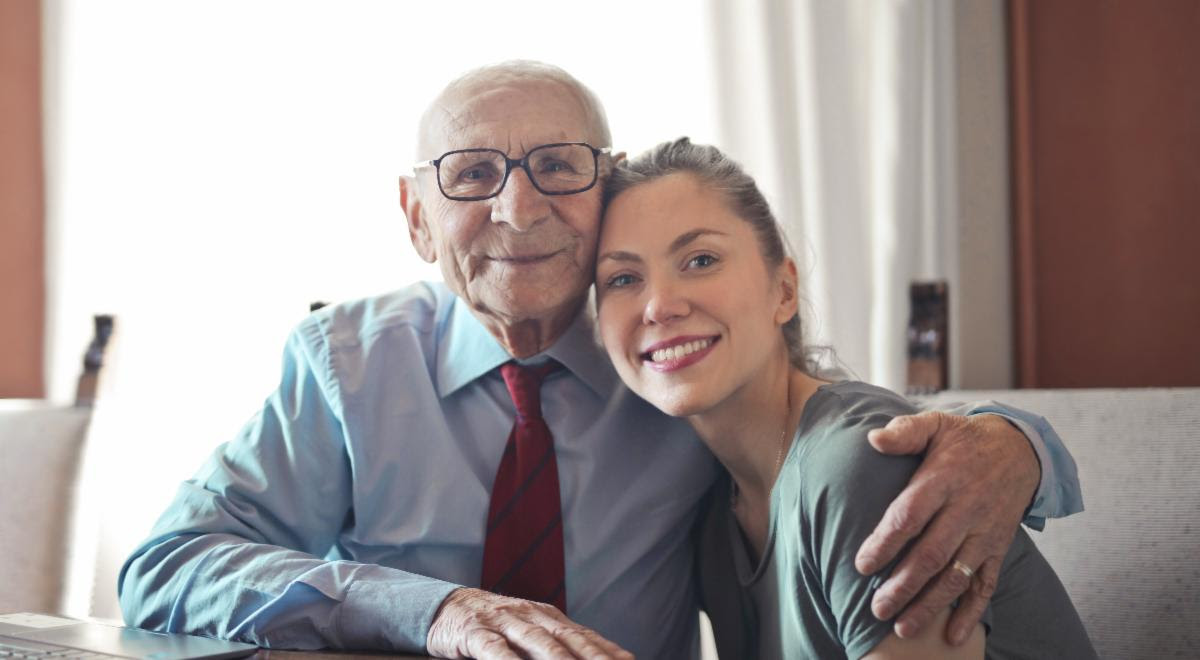 Elderly man with grandaughter