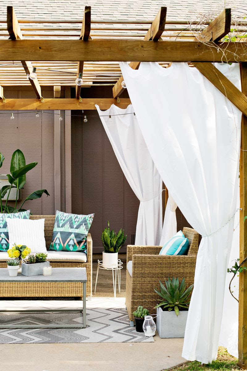 When you want to raise the shade, simply roll or scrunch the fabric up and tie the front and back ribbons together in a bow. Make Your Own Outdoor Pergola Curtains A Beautiful Mess