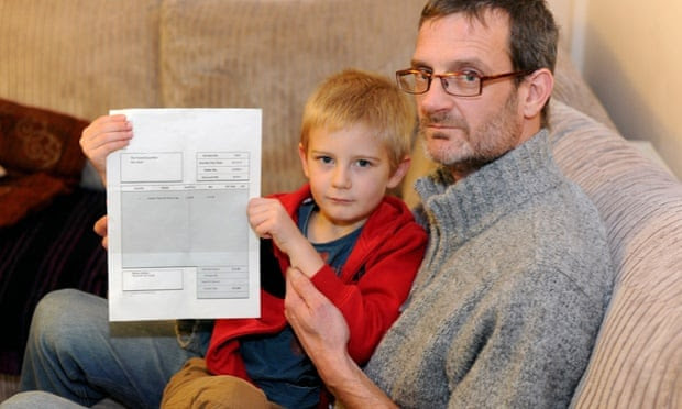 Alex Nash and his father Derek with the invoice for missing the birthday party. Photograph: Photograph: Apex/Lucy Davies