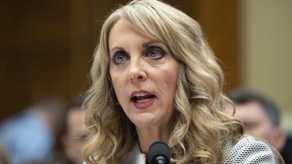 Kerry Perry, shown here testifying to lawmakers in May, has resigned from her post as USA Gymnastics President and CEO.