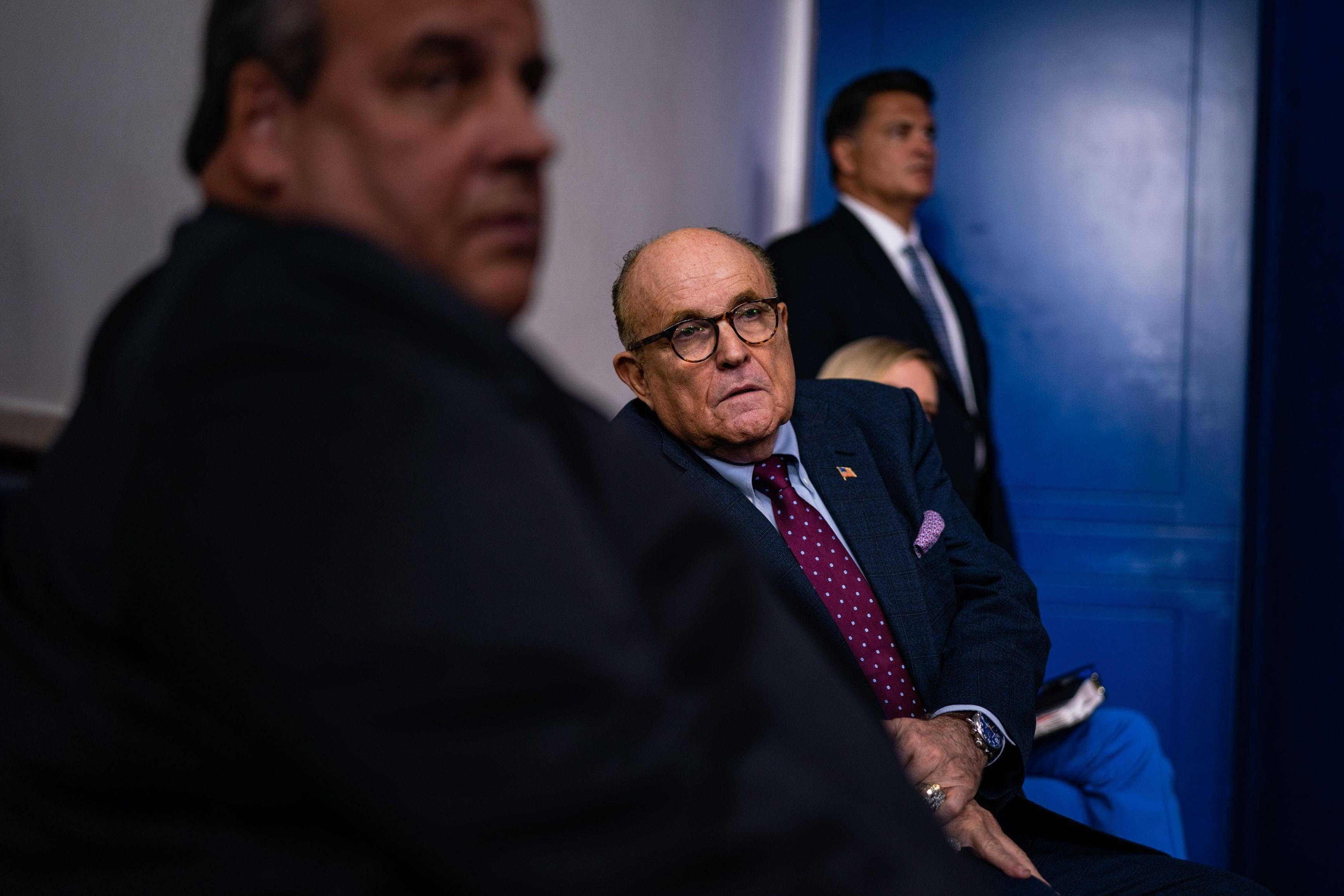 Rudy Giuliani and Chris Christie listen as President Trump speaks at the White House on Sept. 27. (Salwan Georges/The Washington Post)