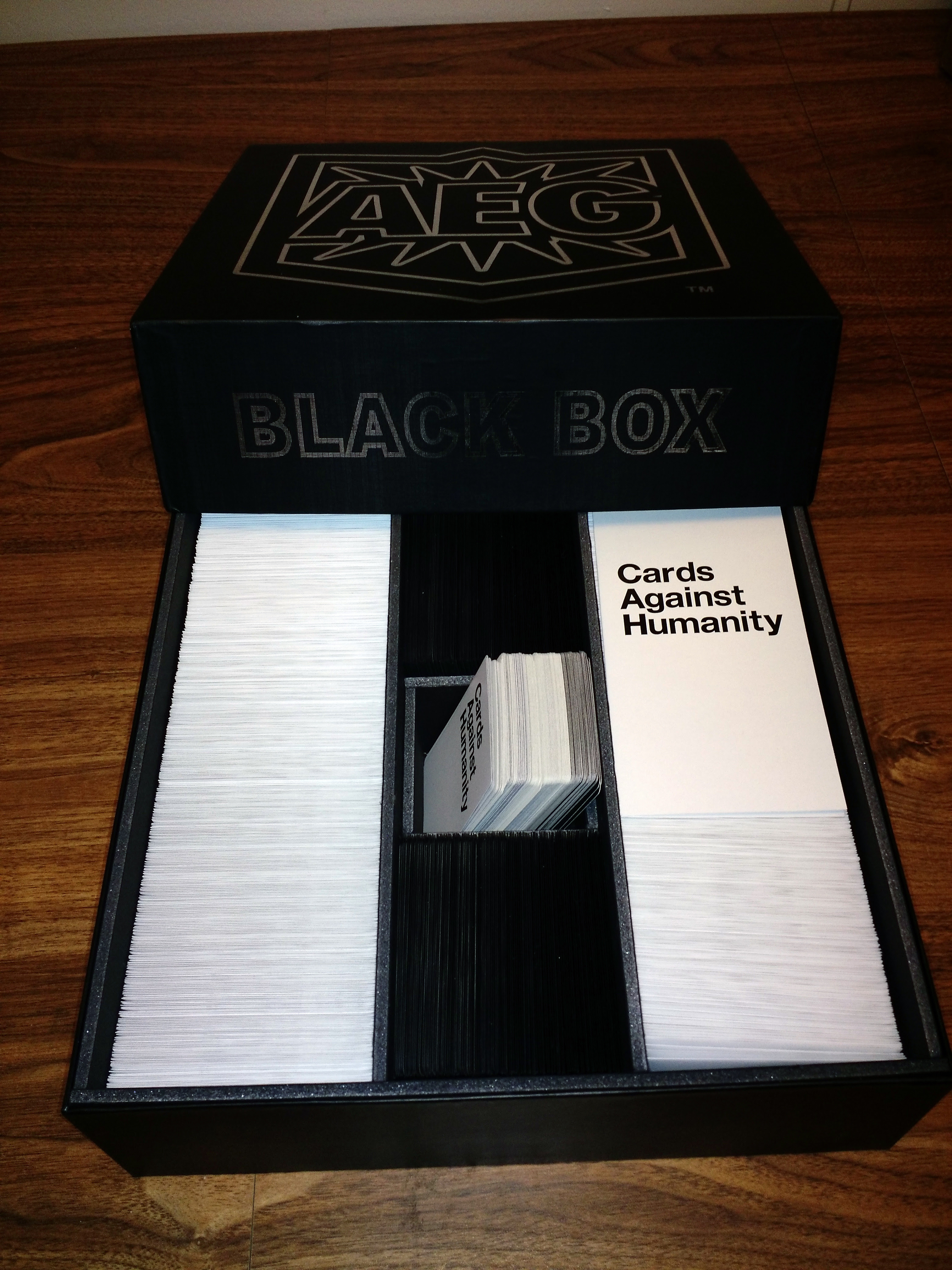 Its title refers to the phrase crimes against humanity, reflecting its polit. Bigger Blacker Box Too Small For Your Cards Against Humanity Needs I Present The Biggest Blackest Box The Aeg Black Box Boardgames