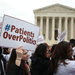 Supporters of the Affordable Care Act gathered outside the Supreme Court during arguments in the King v. Burwell case in March.